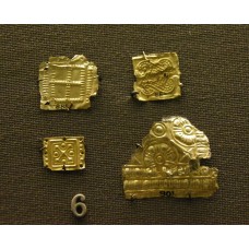 Gold sheet ornaments, cross, swastika, solar symbols